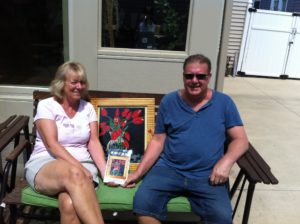 Picture of Dorrance Publishing author, Tom Dean holding his book, "We Met at the Dump."