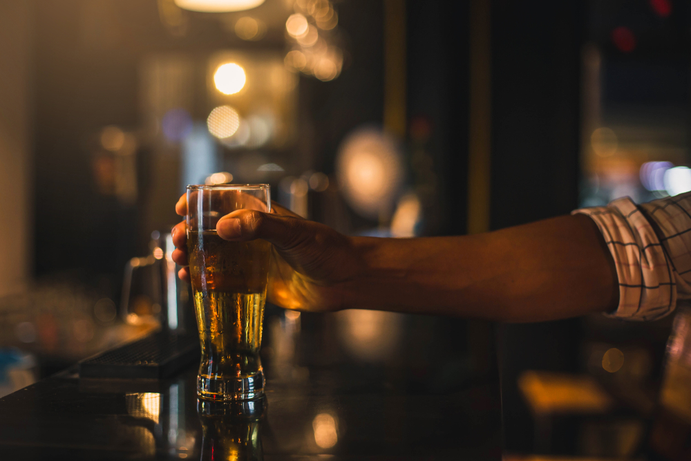 man drinking beer