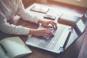 woman writer typing