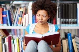 girl reading library