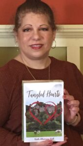 Ruth Altamura-Roll_Tangled Hearts_Dorrance Publishing